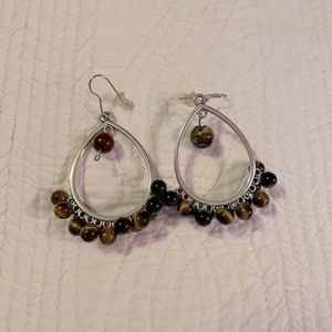 Tigereye earrings have a 21/2” drop.  Sterling silver and AAA grade Tigereye.